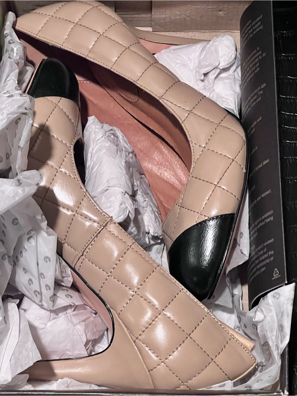 Elegant Quilted Beige and Black Cap-Toe Pumps
